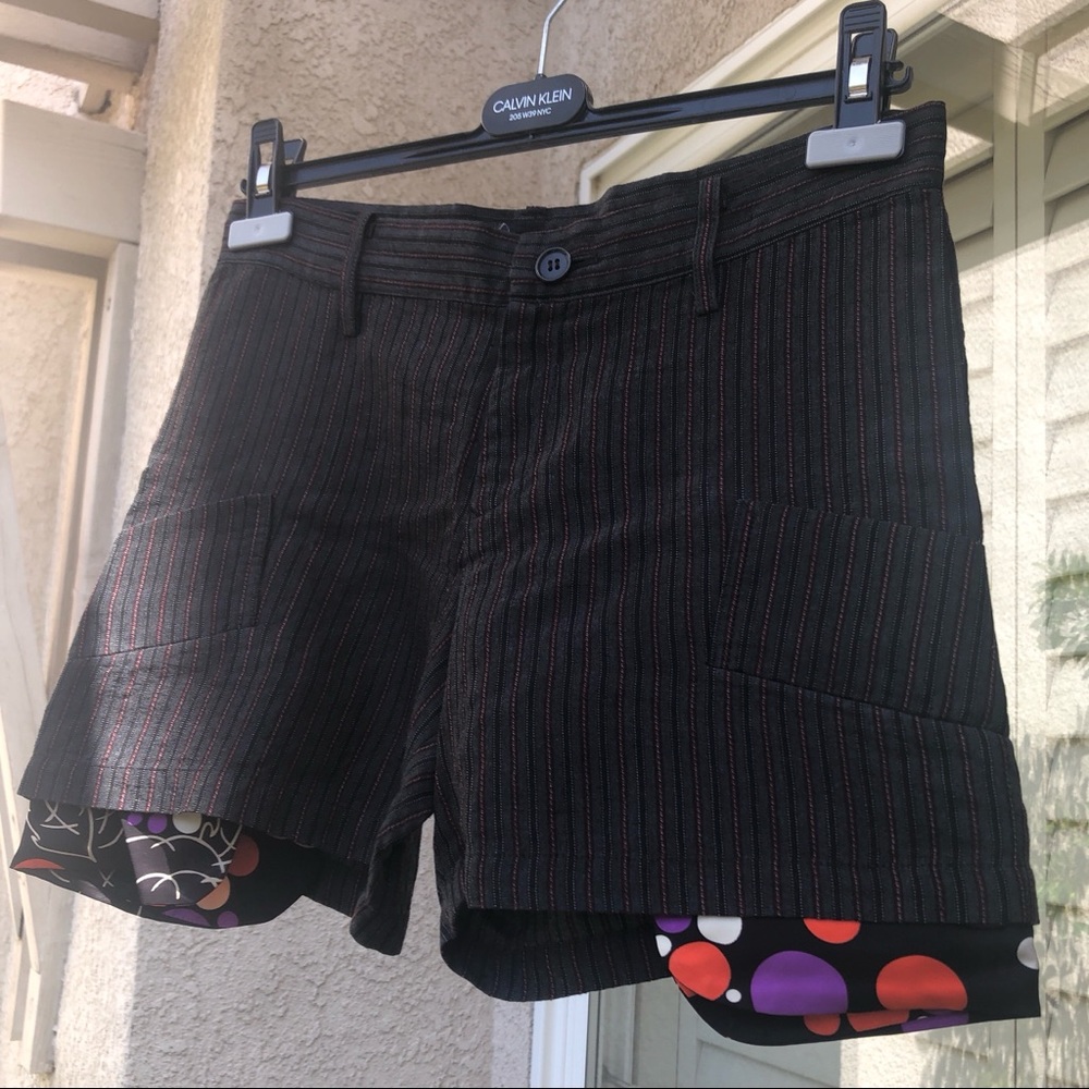 Limi Feu psychedelic exposed pocket shorts